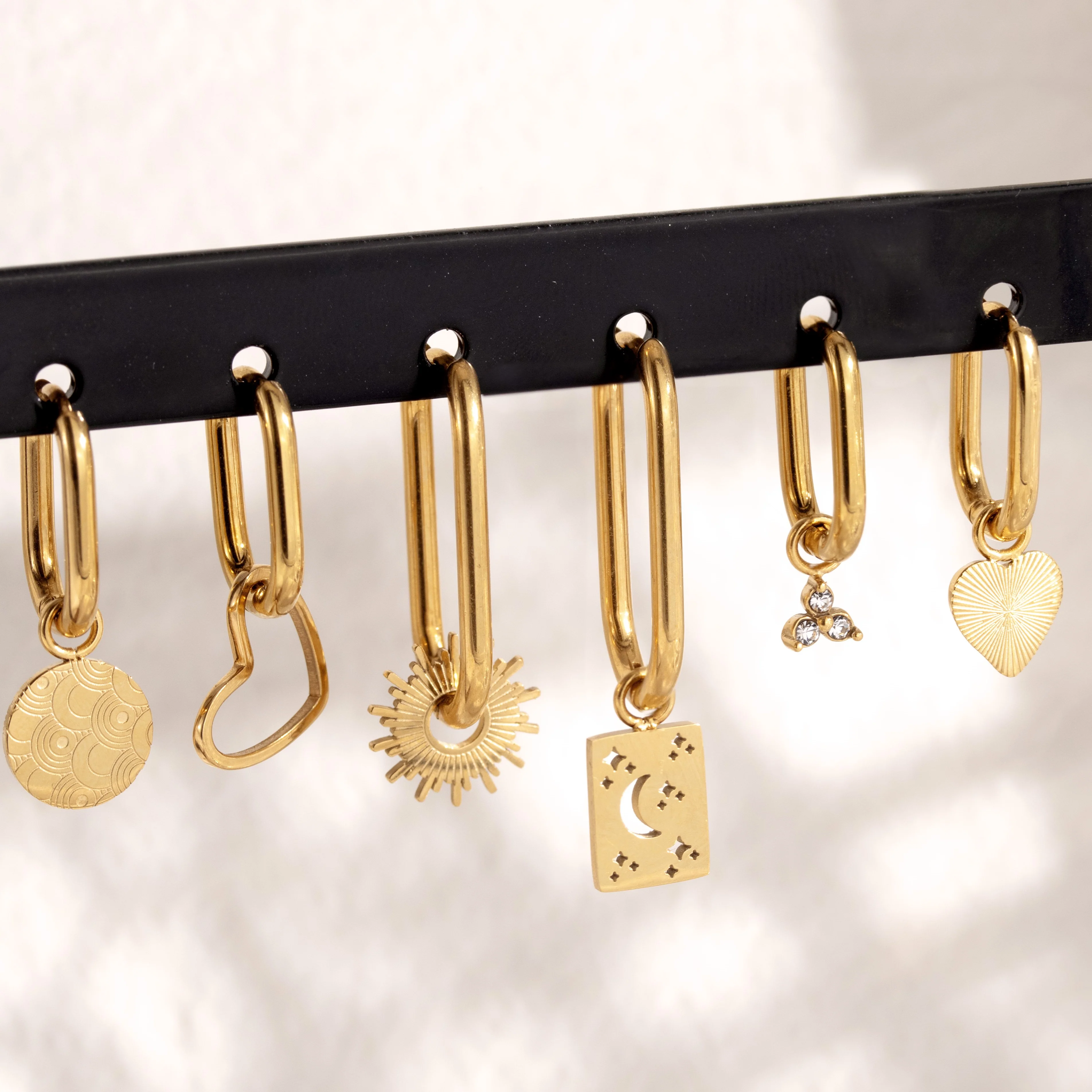 Sun Ray Oval Hoops Small Gold - Image 3